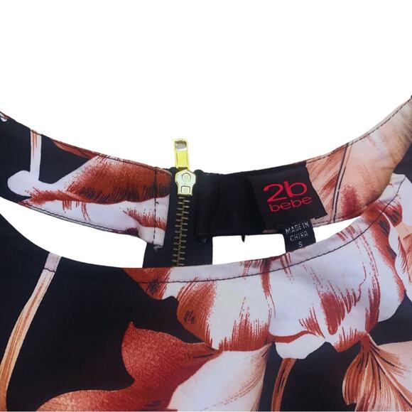 Bebe Peplum Top Blouse Small Dark Floral Cutout Black Pink Wine Short Sleeves - Picture 5 of 11